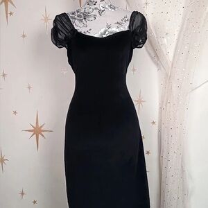 Elegant Black Dress with Sheer Sleeves